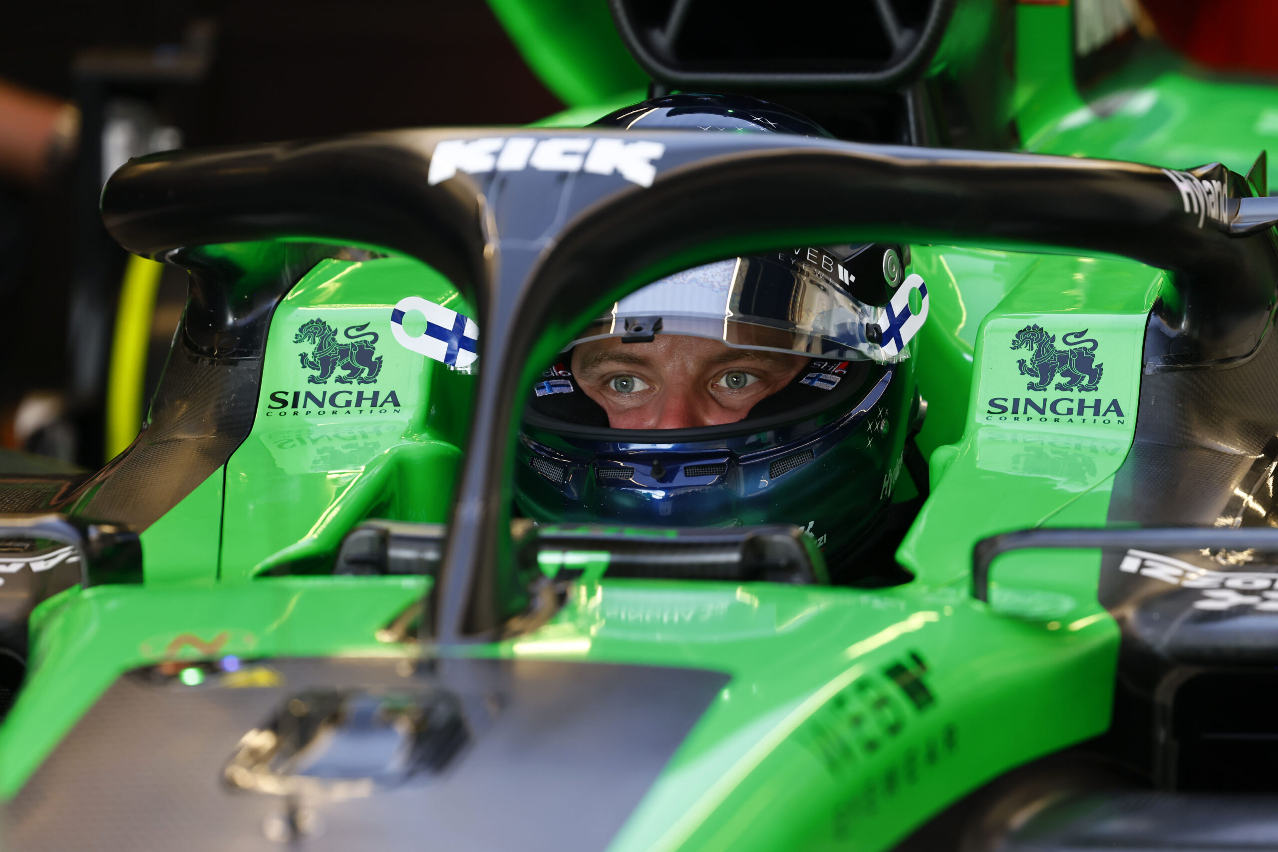Valtteri Bottas in his Sauber F1 car with his helmet on