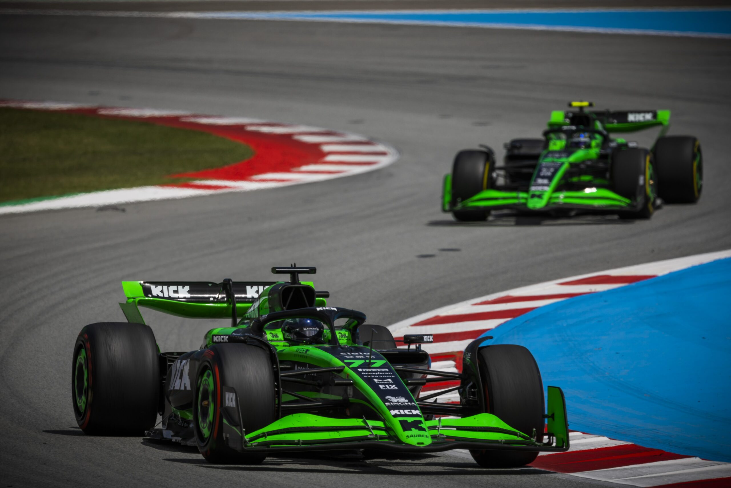 Valtteri Bottas and Zhou Guanyu driving at Circuit De Barcelona-Catalunya