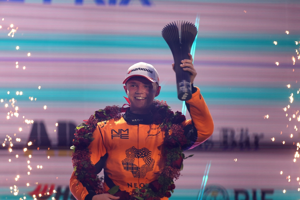 JEDDAH, SAUDI ARABIA - FEBRUARY 14: Third placed Taylor Barnard of Great Britain and NEOM McLaren Formula E Team on the podium after the Jeddah E-Prix, Round 3 of the 2025 FIA Formula E World Championship at Jeddah Corniche Circuit on February 14, 2025 in Jeddah, Saudi Arabia. (Photo by Alastair Staley/LAT Images)