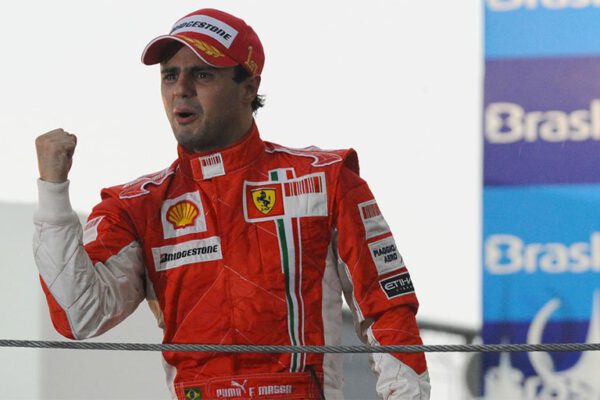 Felipe Massa celebrates in Ferrari race suit