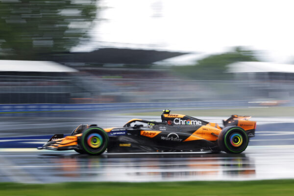 Lando Norris driving his McLaren in the rain in Montreal