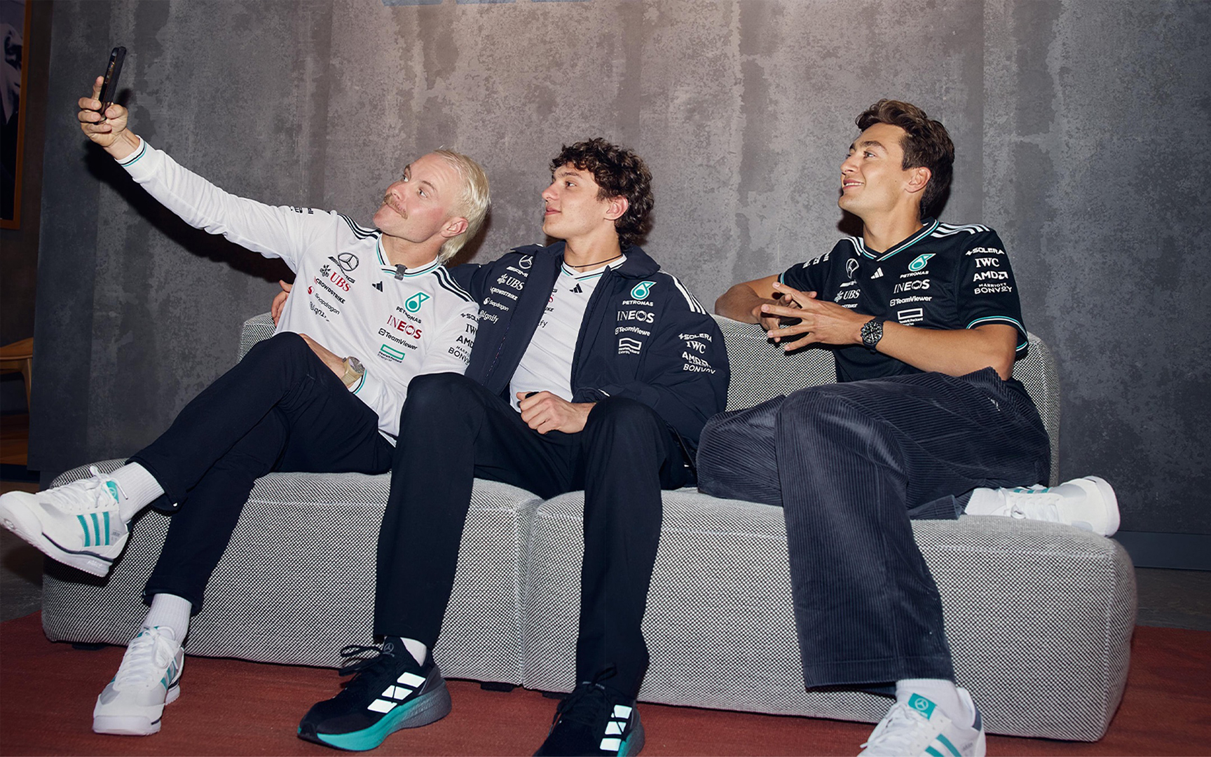 Valtteri Bottas, Kimi Antonelli and George Russell attend the launch of Mercedes F1 team's partnership with Adidas