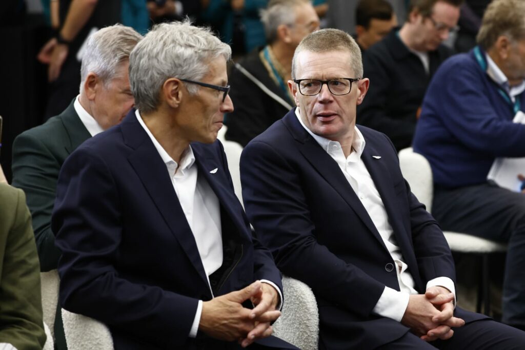 Former Aston Martin F1 team principal Mike Krack talking to new boss Andy Cowell at Adrian Newey's unveiling last year. 