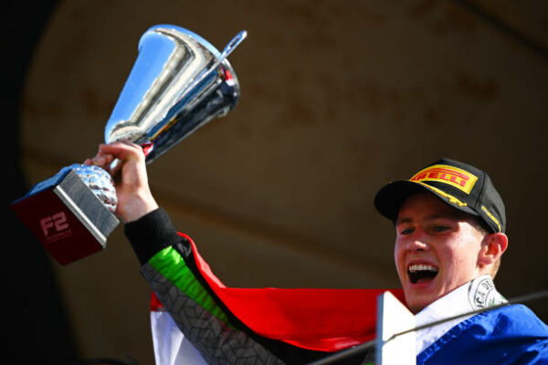 ABU DHABI, UNITED ARAB EMIRATES - DECEMBER 08: Race winner Joshua Durksen of Paraguay and AIX Racing (24) celebrates on the podium during the Round 14 Yas Island Feature race of the Formula 2 Championship at Yas Marina Circuit on December 08, 2024 in Abu Dhabi, United Arab Emirates.