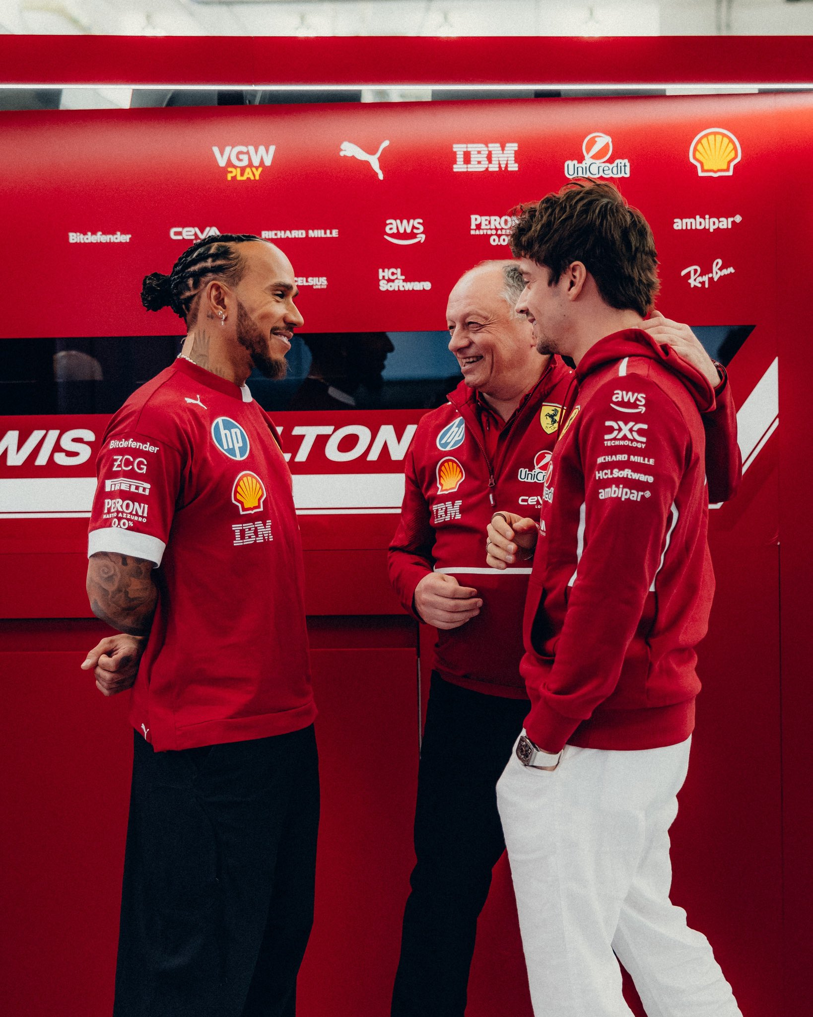 Fred Vasseur, Lewis Hamilton and Charles Leclerc in Scuderia Ferrari HP garrage