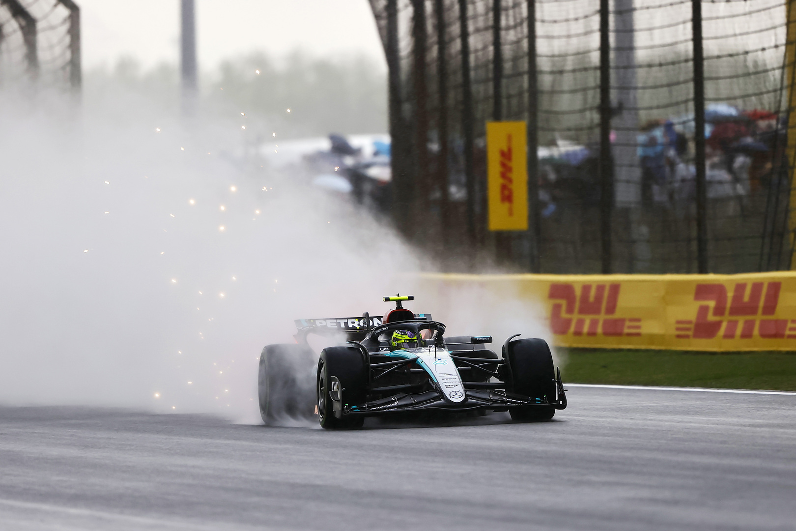Lewis Hamilton driving in Chhina in the rain