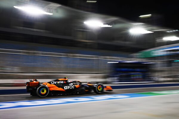 Lando Norris driving his McLaren down the pit lane in Bahrain