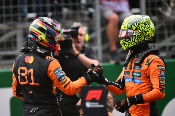 Lando Norris (right) congratulates his race-winning teammate at the 2025 Chinese Grand Prix.