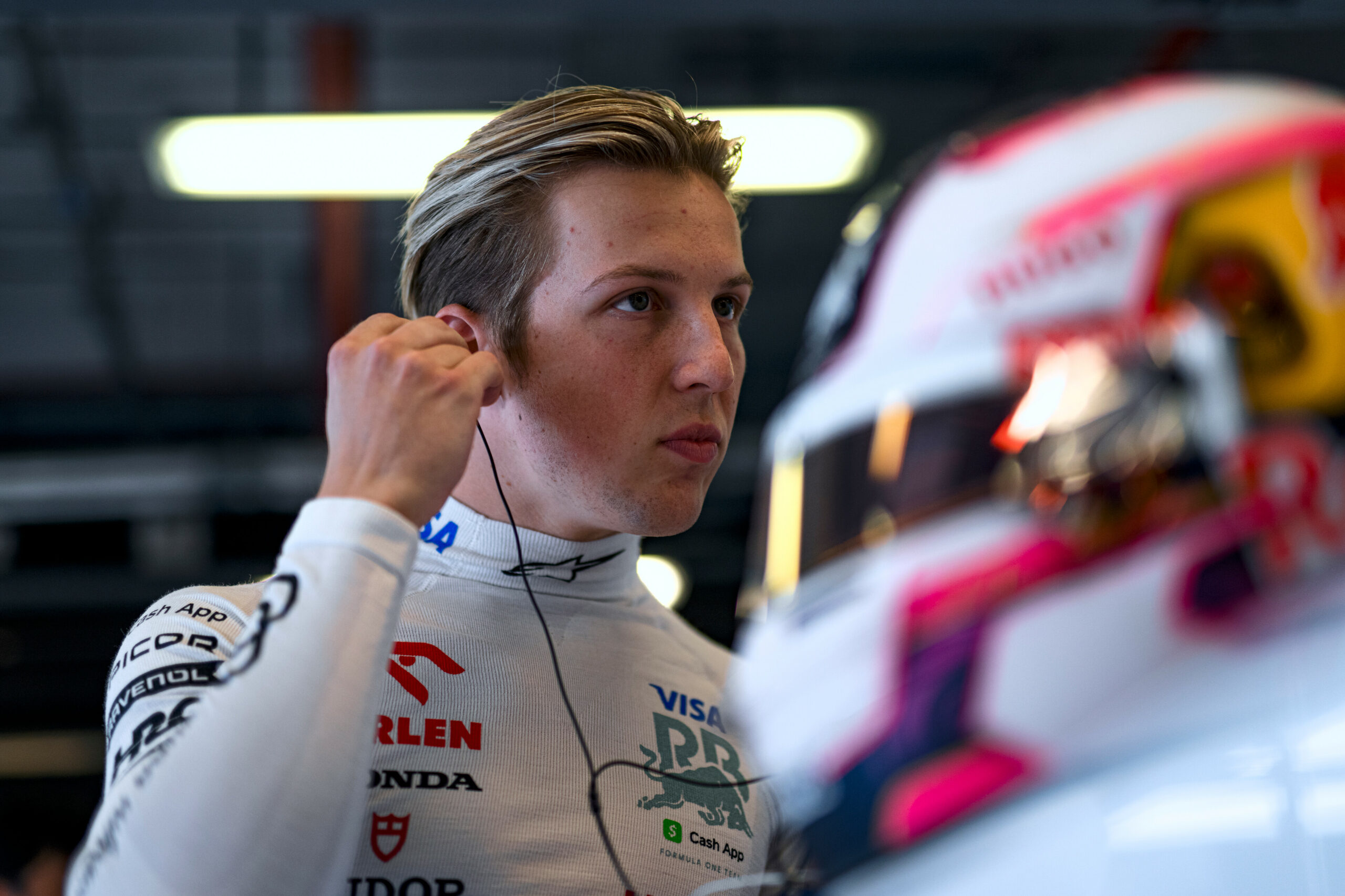 ABU DHABI, UNITED ARAB EMIRATES - DECEMBER 06: Liam Lawson of New Zealand and Visa Cash App RB prepares to drive in the garage during practice ahead of the F1 Grand Prix of Abu Dhabi at Yas Marina Circuit on December 06, 2024 in Abu Dhabi, United Arab Emirates. (Photo by Rudy Carezzevoli/Getty Images) // Getty Images / Red Bull Content Pool // SI202412060569 // Usage for editorial use only //