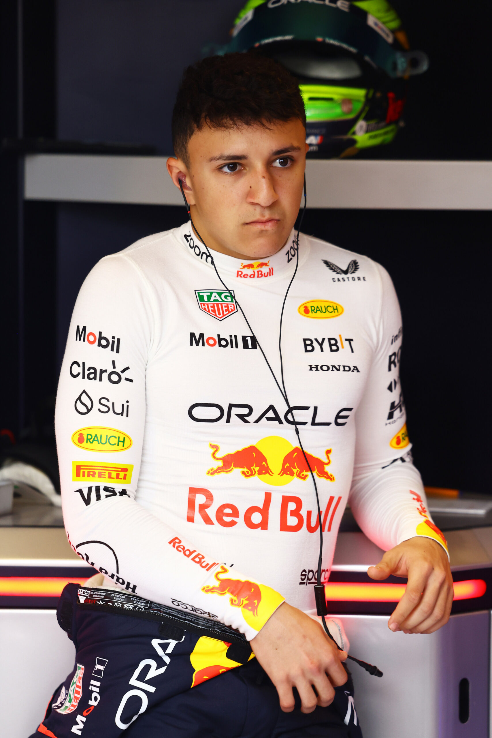 Isack Hadjar, Racing Bulls driver for 2025 season, getting his seat and radio fix during his Formula 1 Testing in Abu Dhabi