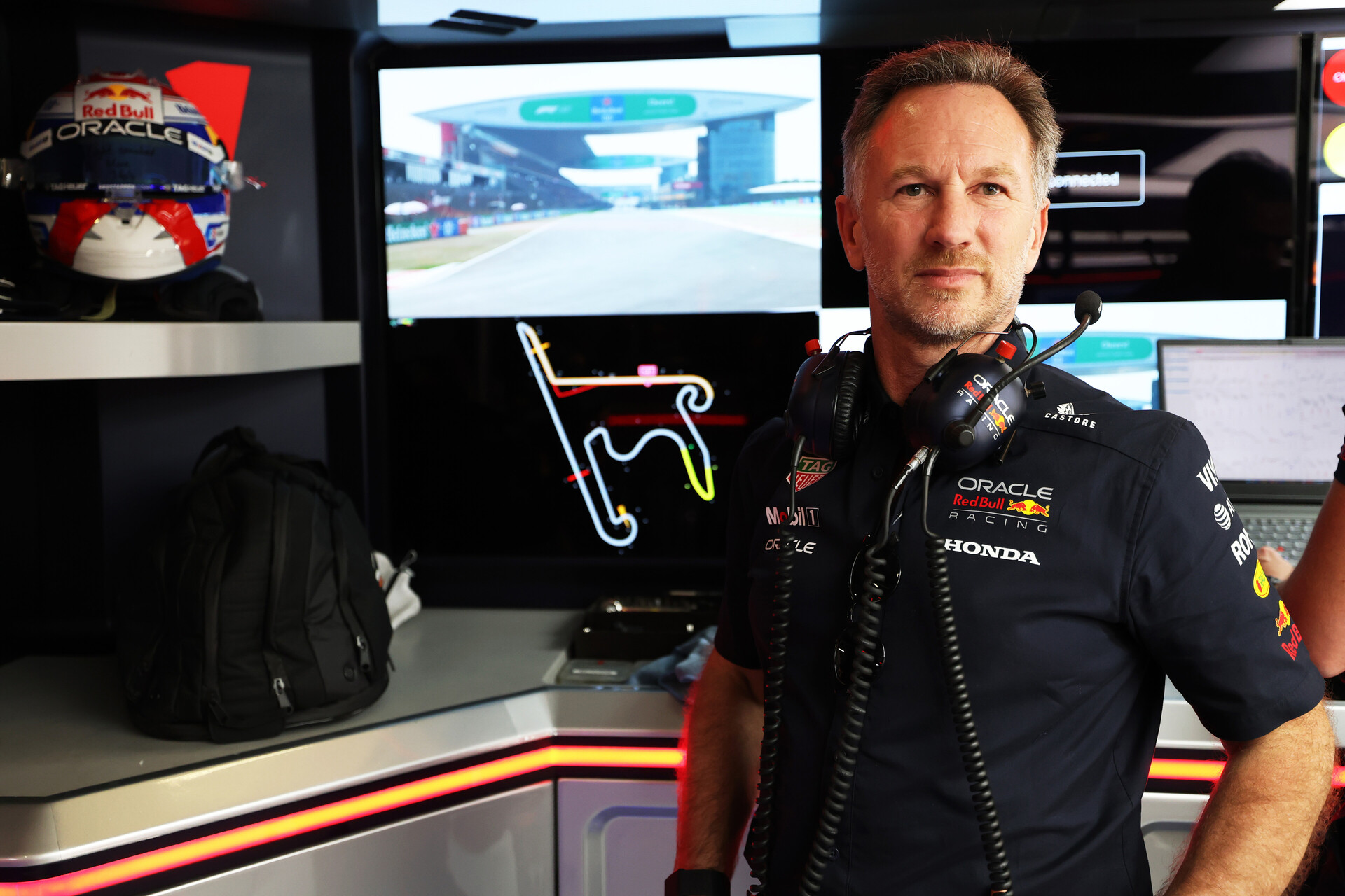 Christian Horner looks on in the Red Bull garage ahead of F1 Chinese GP