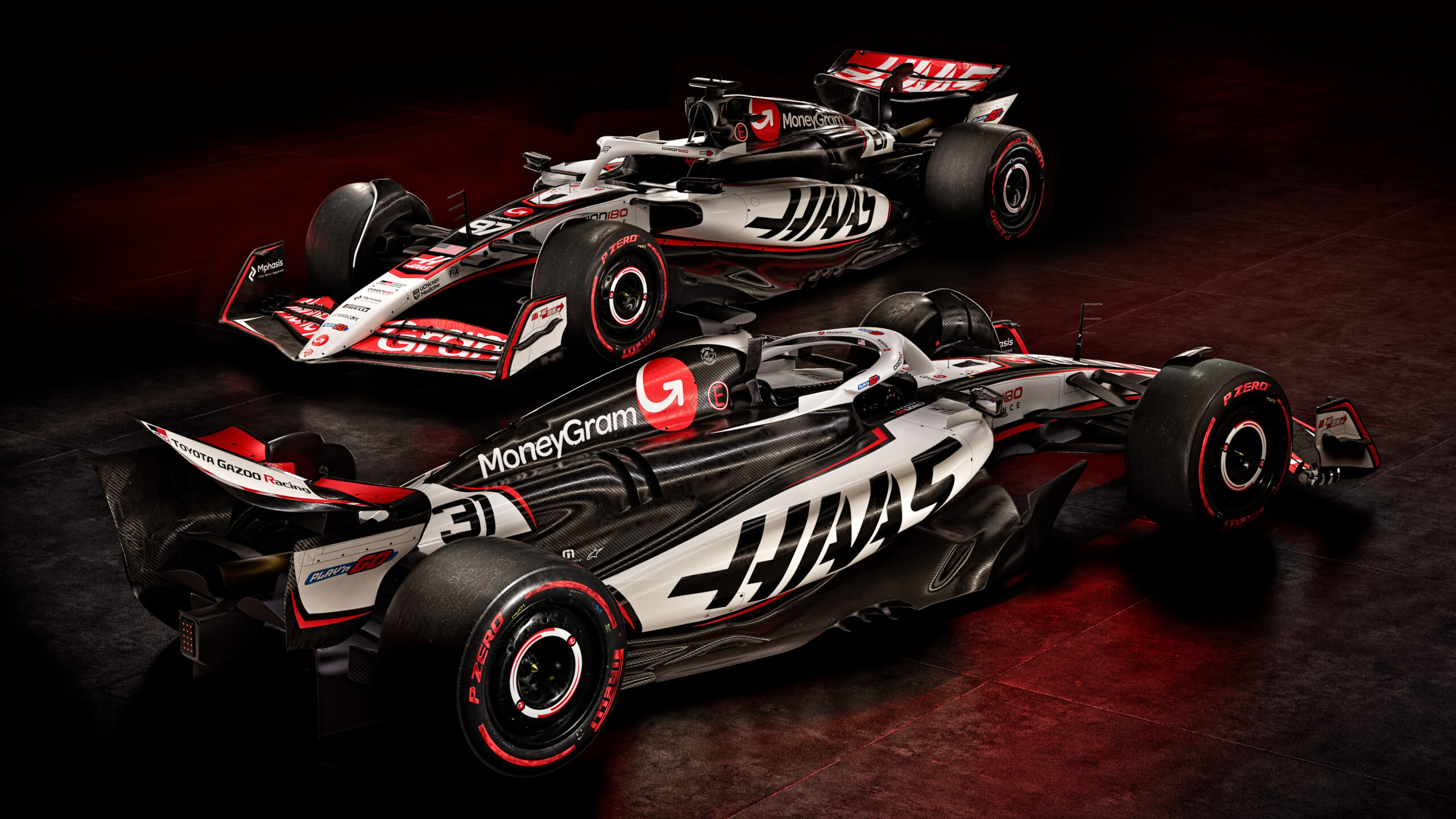 Haas unveils VF-25 livery at 2025 F1 75 Season Launch Event. Their drivers will be Esteban Ocon and Oliver Bearman.