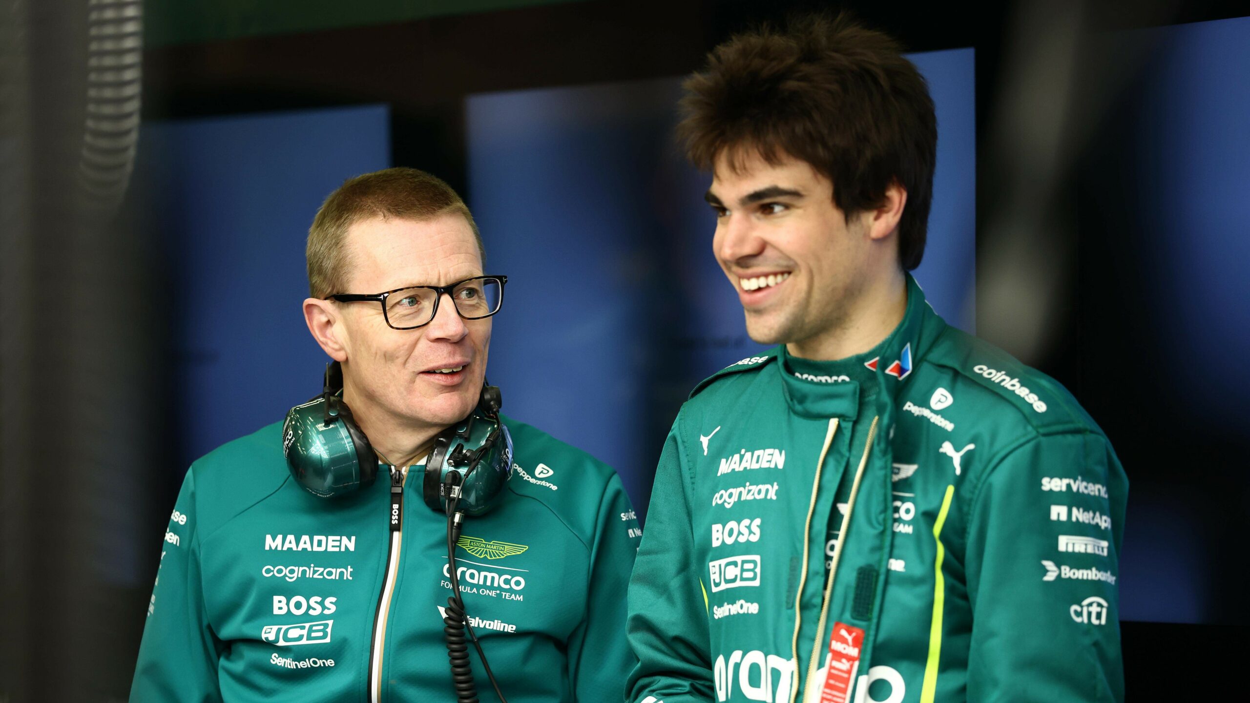 Andy Cowell, Team Principal and Group CEO at Aston Martin F1 Team, and Lance Stroll of Canada and Aston Martin F1 Team talk in the garage before the first race in Melbourne.