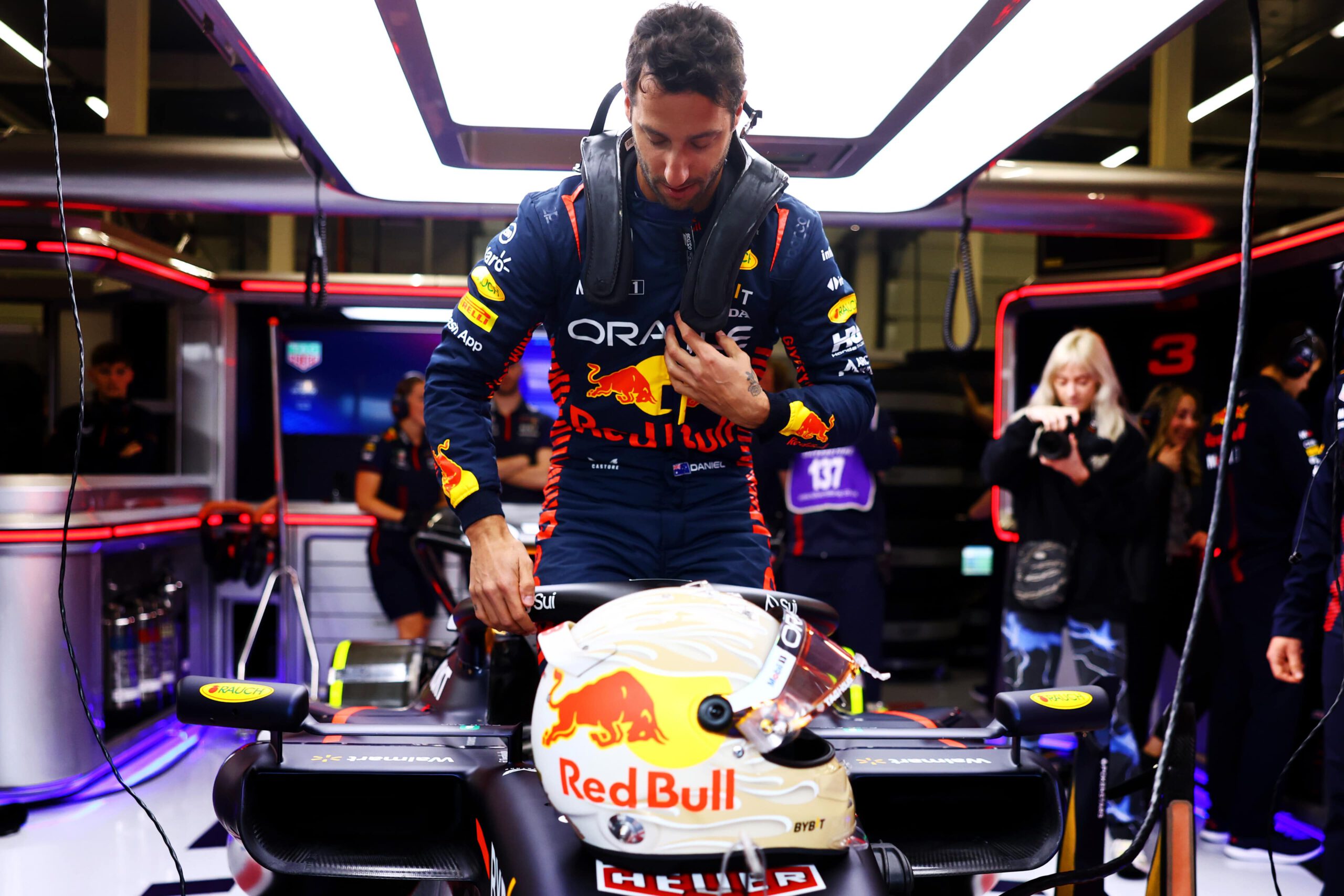 Daniel Ricciardo sits into the RB19 