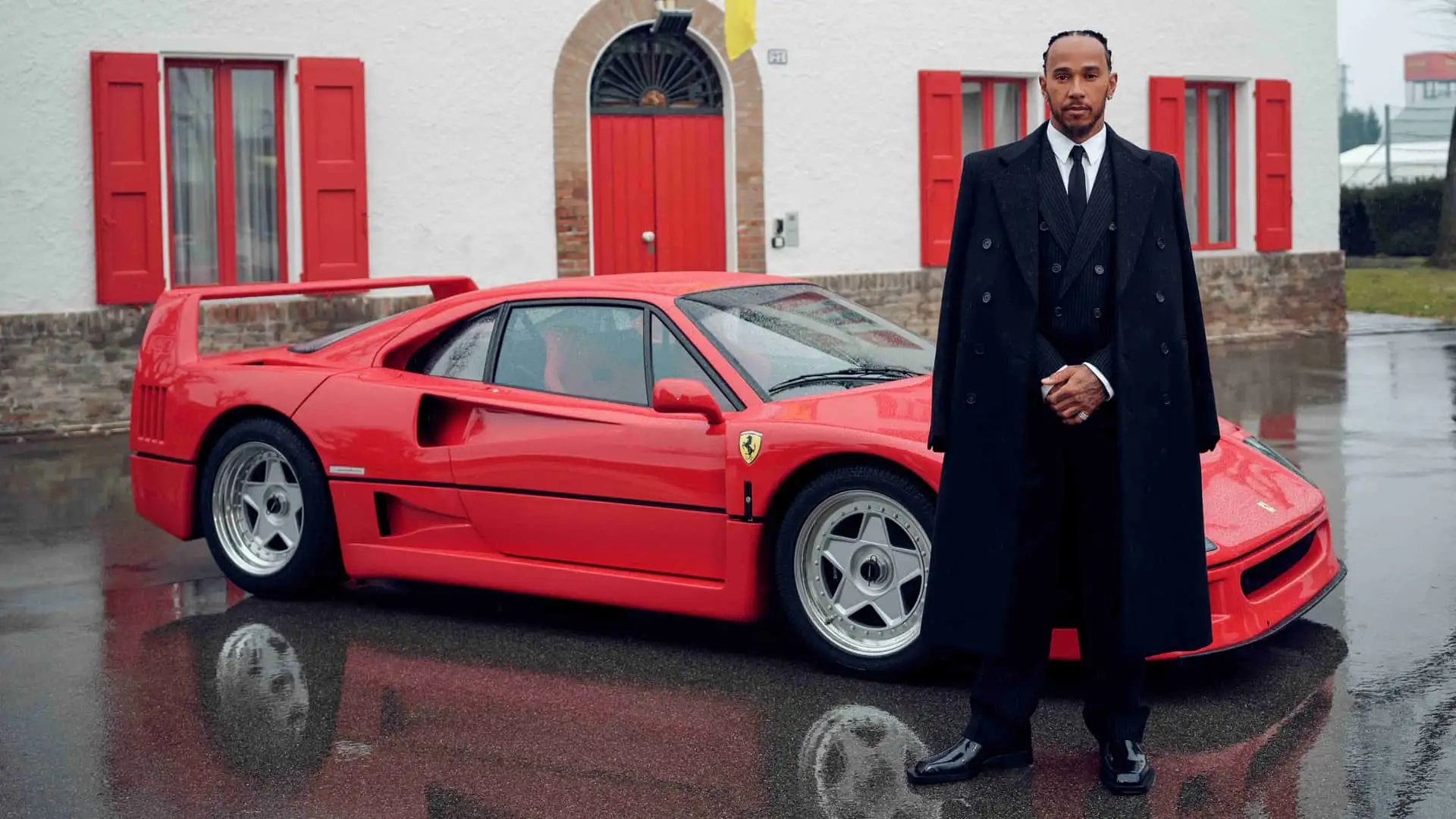 Lewis Hamilton is now a Ferrari Formula 1 driver. Here he is in front of a F40 on Monday.