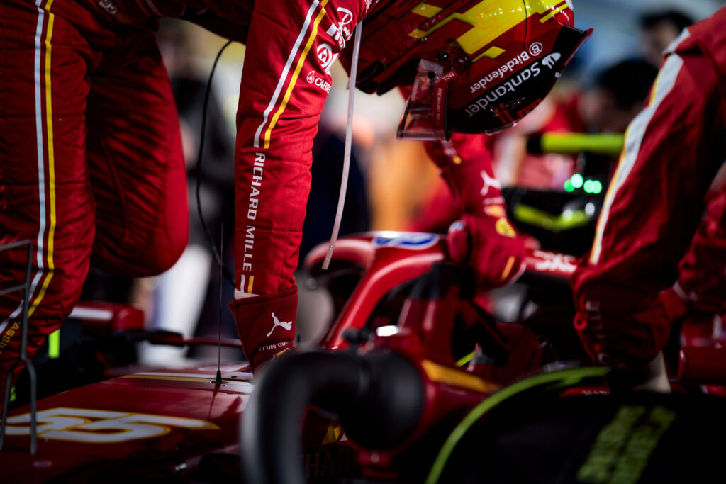 Carlos Sainz exits his Ferrari after a damage limitation drive during the 2024 Qatar GP