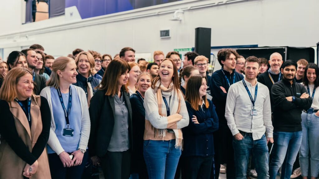 Crowd shot of Williams Racing personnel smiling in attendance at Grove HQ  Q&A session